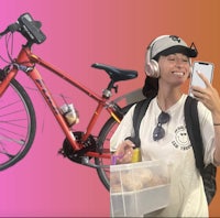 a woman is taking a selfie with her bike